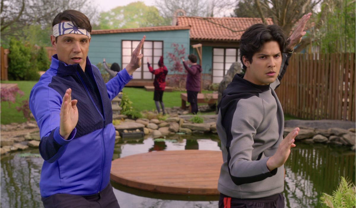 Cobra Kai. (L to R) Ralph Macchio as Daniel LaRusso, Xolo Maridueña as Miguel Diaz in Cobra Kai. Cr. Courtesy of Netflix © 2021.