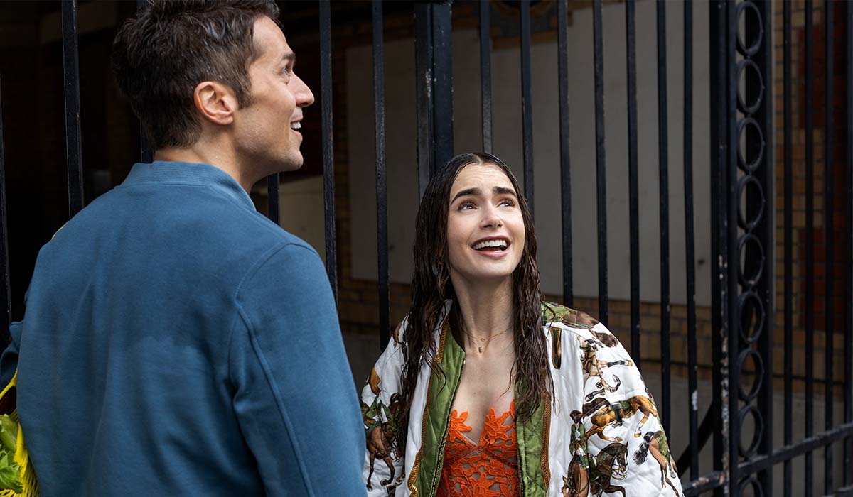 Lucas Bravo and Lily Collins in the television series Emily in Paris.  Credits: Carole Bethuel / Netflix.