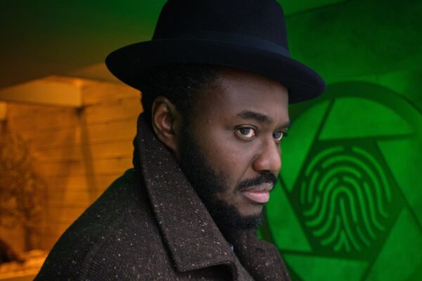 Babou Ceesay Interpreta l'investigatore Wolfe In 