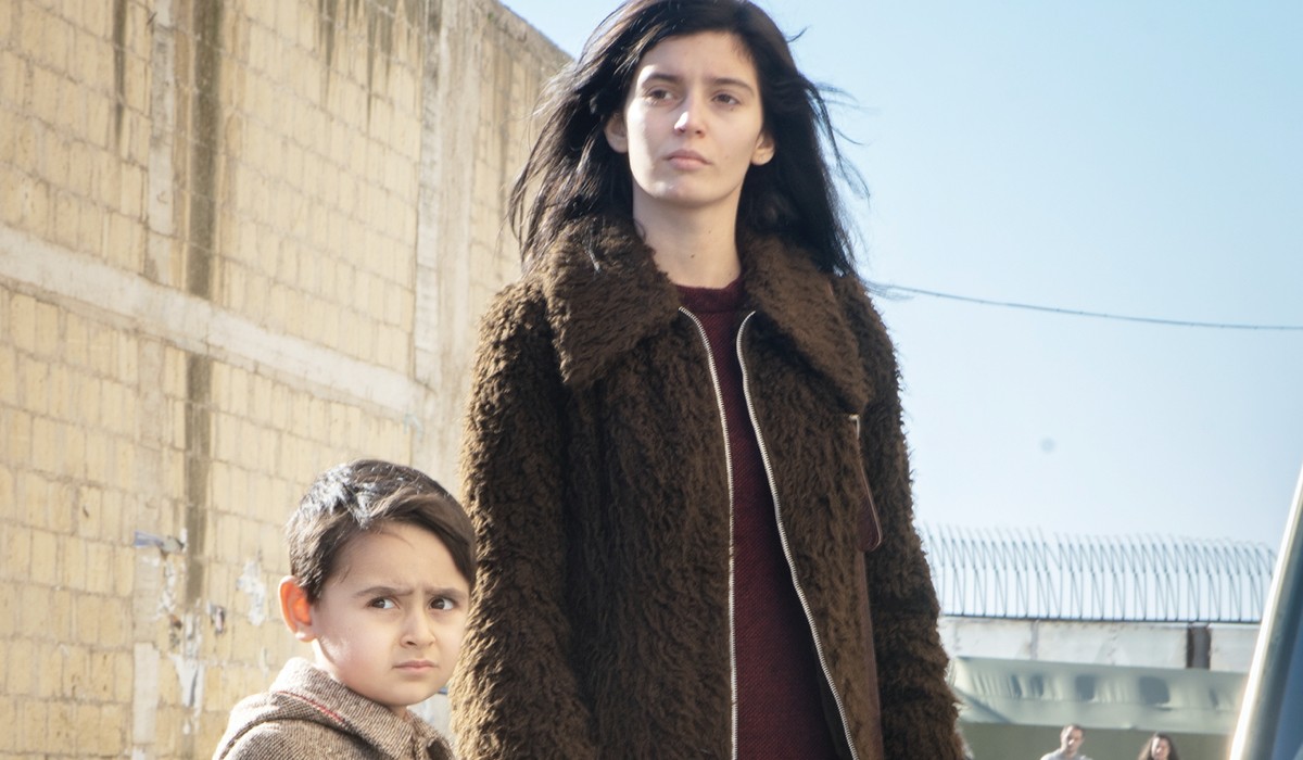 Gaia Girace (Lila Cerullo) with Gennaro in a scene from
