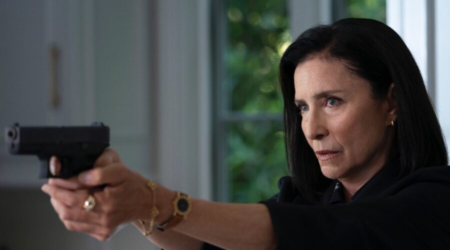 Mimi Rogers In Una Scena Di 