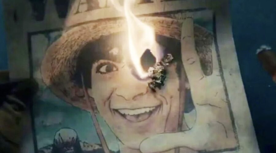 Il poster di Luffy bruciato dal sigaro nell'ultima puntata di “One Piece”. Credits: Netflix/Cattura schermo.