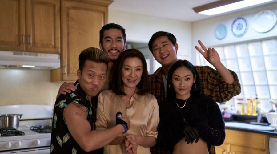 Joon Lee As Tk, Justin Chien As Charles Sun, Michelle Yeoh As Mama Sun, Sam Song Li As Bruce Sun, Alice Hewkin As June In Episode 108 Of The Brothers Sun. Cr. Michael Desmond Netflix